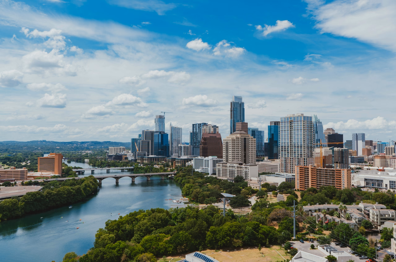 Austin skyline and river - remote tech jobs in Austin
